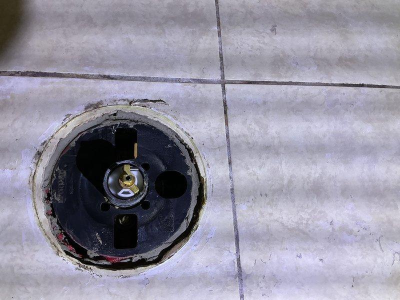 Responded to emergency service call for shower faucet that could not be shut off. Upon arrival, assessed the shower valve assembly and successfully repaired the malfunctioning shutoff mechanism, restoring proper water control to the fixture. Documented existing tile damage near the faucet installation and floor drain condition for customer records.