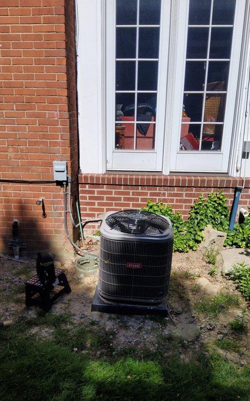 Completed comprehensive cooling system tune-up and maintenance on Bryant outdoor condensing unit. Performed full system inspection, verified refrigerant levels, cleaned condenser coils, checked electrical connections, tested capacitor and contactor operation, and confirmed proper drainage through PVC condensate lines. Unit operating within manufacturer specifications with no issues identified.