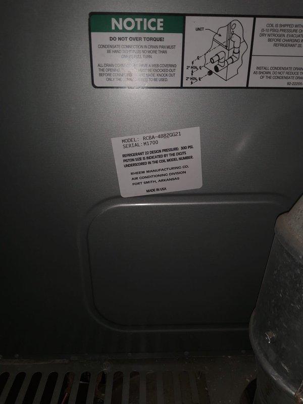 Responded to no-cooling call on 15+ year old Rheem air conditioning unit (Model: RCBA-48B20G21). Found tripped circuit breaker at electrical panel, reset breaker and restored power to system. Verified unit operation and confirmed cooling cycle resumed normally with no further issues observed.