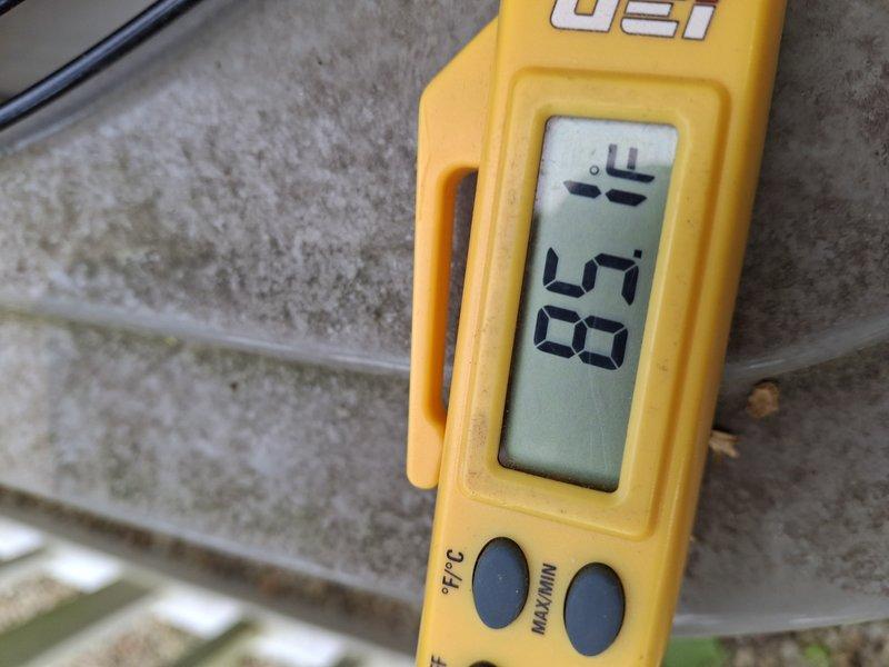 Performed comprehensive A/C tune-up including inspection of evaporator coil fins and heat exchanger assembly. Verified system temperatures with digital thermometer, recording supply air temperature of 57.65°F, confirming proper cooling performance and refrigerant charge levels.