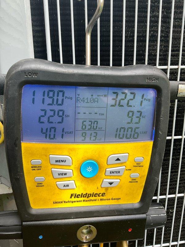 # AC Tune-Up Completed

Performed comprehensive tune-up on 17-year-old R-410A air conditioning system. System pressures measured at 119.0 PSIG low side and 322.7 PSIG high side using refrigerant manifold gauge. Superheat reading of 22.9°F and subcooling of 93°F recorded during diagnostic testing. Inspected condenser coil and verified unit specifications on data plate (Model: DNPVP6024ALAAAAA, manufactured December 2019). All routine maintenance procedures completed per manufacturer specifications, and system operational parameters documented for future reference.