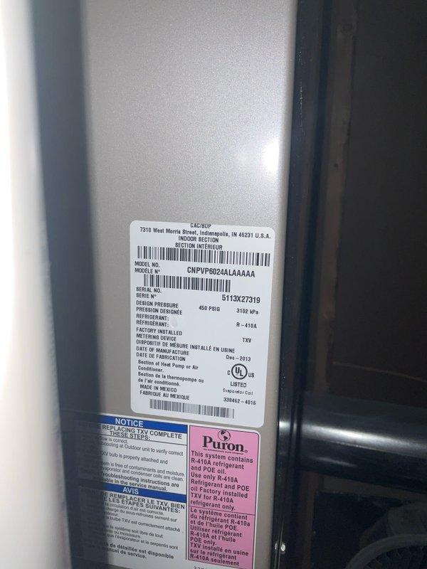 # AC Tune-Up Completed

Performed comprehensive tune-up on 17-year-old R-410A air conditioning system. System pressures measured at 119.0 PSIG low side and 322.7 PSIG high side using refrigerant manifold gauge. Superheat reading of 22.9°F and subcooling of 93°F recorded during diagnostic testing. Inspected condenser coil and verified unit specifications on data plate (Model: DNPVP6024ALAAAAA, manufactured December 2019). All routine maintenance procedures completed per manufacturer specifications, and system operational parameters documented for future reference.