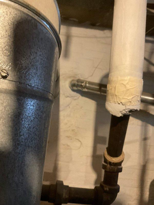 Responded to emergency water heater failure and provided estimate for replacement of failed tanked hot water heater unit. Upon inspection, found existing water heater had catastrophically failed in basement mechanical room. Documented current installation configuration including copper supply lines, gas connections, and venting system. Assessed surrounding plumbing infrastructure and clearances for new unit installation. Photographed failed equipment and existing piping arrangement to prepare accurate replacement estimate for customer approval.
