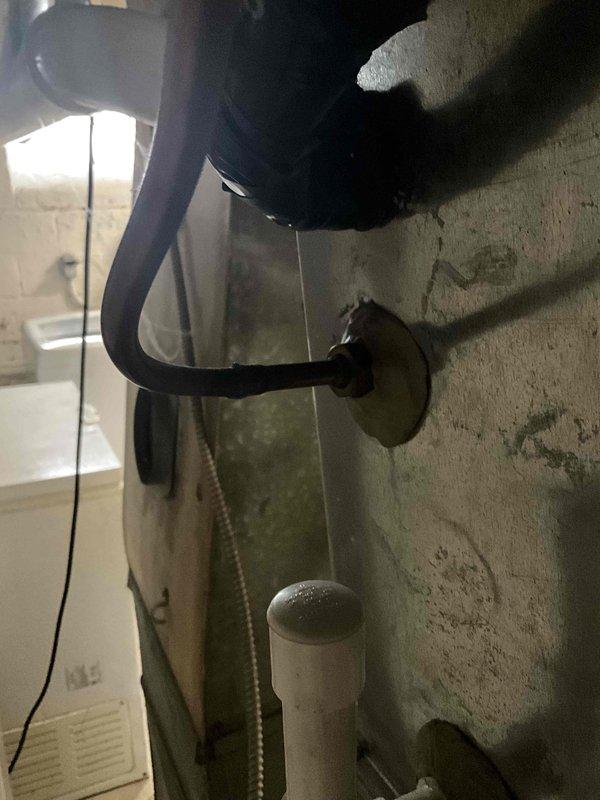 Responded to no cooling complaint and performed system evaluation. Upon inspection, assessed existing furnace and HVAC equipment configuration in basement mechanical room, including custom-built enclosure, ductwork routing, and associated plumbing connections. Documented current equipment condition and provided replacement estimate for new system installation.