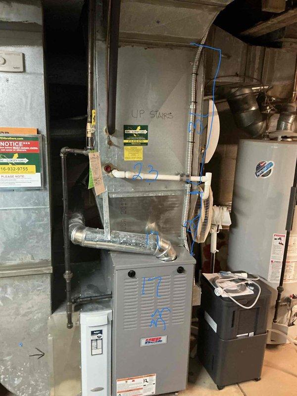 Completed dual air conditioning estimate for basement mechanical room installation. Assessed existing HVAC system configuration including furnace unit, air handler cabinet, ductwork connections, and associated electrical components. Documented current equipment layout, clearances, and utility connections to provide comprehensive replacement recommendations for two AC units.