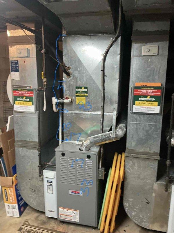 Completed dual air conditioning estimate for basement mechanical room installation. Assessed existing HVAC system configuration including furnace unit, air handler cabinet, ductwork connections, and associated electrical components. Documented current equipment layout, clearances, and utility connections to provide comprehensive replacement recommendations for two AC units.