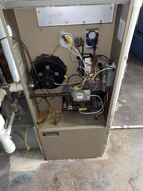 # HVAC Service Call - No Cooling Condition

Responded to a no cooling complaint affecting the entire second floor unit. Upon arrival, accessed the air handler cabinet to inspect internal components and verify system operation. Performed visual inspection of the blower motor assembly, control boards, and electrical connections. Checked refrigerant pressures using manifold gauges to assess system charge levels and identify potential issues with the cooling cycle.

Examined all visible electrical components including transformers, relays, and wiring connections for proper operation and signs of failure. Inspected copper refrigerant lines at the air handler for leaks, damage, or restrictions. Verified proper condensate drainage through PVC piping system. Evaluated overall system condition and documented findings with photographic evidence of internal components and equipment identification showing second floor designation marked on the Clima 50 unit.

System assessed and appropriate correc