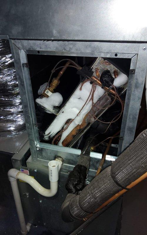 Responded to service call for insufficient cooling with thermostat set to 69°F but indoor temperature only reaching 75°F on a 3-year-old system. Upon inspection, discovered evaporator coil frozen, indicating restricted airflow or low refrigerant charge. Documented refrigerant line conditions showing oxidation on copper tubing and inspected air handler components. Advised unit must thaw completely before diagnostic testing can continue, and scheduled follow-up appointment to perform refrigerant charge verification, airflow measurements, and complete system evaluation once coil has defrosted.