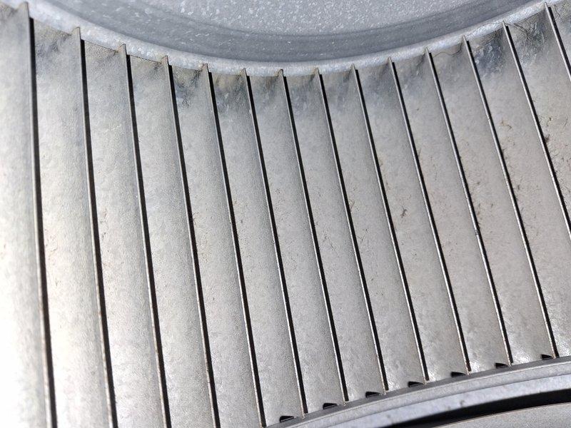 Performed comprehensive air conditioning tune-up on a fifteen-year-old system that was operating without issues. Inspected and evaluated the air filter, which showed moderate dust and dirt accumulation throughout the pleated media, indicating normal use over its service period. Connected manifold gauge set to measure system pressures and verify refrigerant charge levels, confirming the unit was functioning within proper operating parameters.