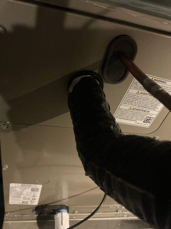 Responded to no cooling complaint on unit installed in April with multiple previous service calls. Upon arrival, found thermostat displaying 24-hour scheduled relay message, which was determined to be unrelated to the cooling issue. Inspected air handler unit and documented equipment condition, including ductwork connections and manufacturer labels. Advised customer that thermostat display was a scheduling feature and not indicative of system malfunction requiring service.