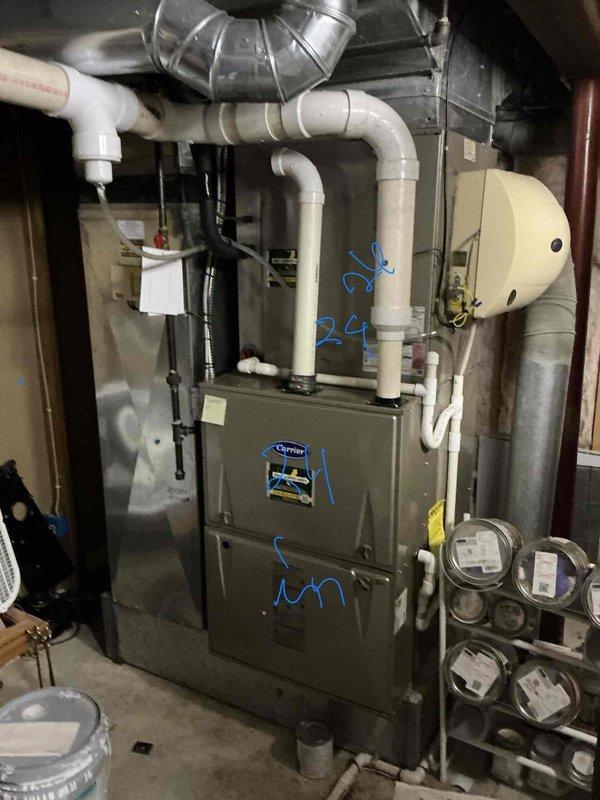 Responded to no cooling complaint at residential property. Upon arrival, evaluated existing HVAC system located in basement utility area. System assessment revealed equipment requiring replacement. Provided comprehensive estimate for complete HVAC system replacement including furnace and associated components. Documented existing installation configuration including ductwork connections, PVC drainage and ventilation piping, and current equipment specifications for replacement planning purposes.