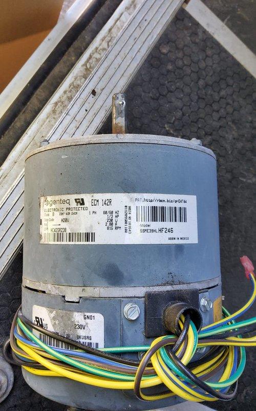 Replaced defective condenser fan motor and blade on Bryant outdoor unit under parts warranty coverage. Installed new Genteq ECM motor (1/4 HP, 230V) with proper wiring connections and verified operational performance during tune-up service completed at customer's requested time.