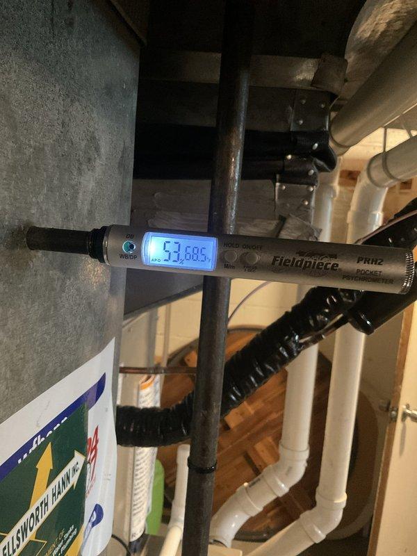 Responded to no-cooling complaint on 2-month-old air conditioning system that has not functioned properly since installation. Performed comprehensive diagnostic evaluation using digital manifold gauges to measure refrigerant pressures, temperatures, and superheat/subcooling values at outdoor condensing unit. Assessed system charge levels and operational parameters. Evaluated indoor furnace unit in basement using digital thermometer probe to verify temperature differentials and airflow compatibility between 14-year-old gas furnace and new AC system. Inspected thermostat programming and wiring configuration to identify potential communication issues between components. Documented system performance with diagnostic readings and photographic evidence of equipment conditions.