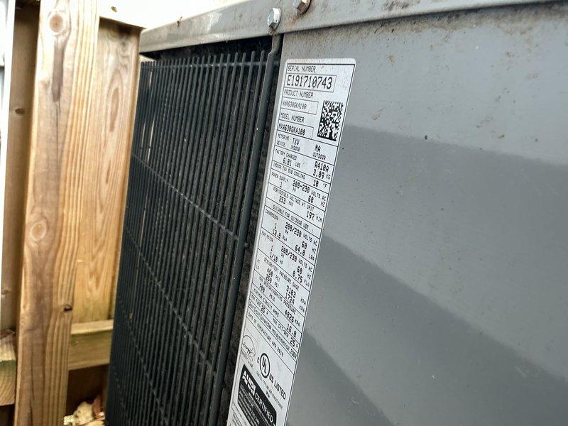 Completed routine air conditioner maintenance on a six-year-old residential cooling system. Performed comprehensive AC tune-up including inspection of outdoor condenser unit, verification of fan operation, examination of condenser coils, and review of manufacturer specifications. System found to be operating properly with no deficiencies noted; unit maintained in good working condition.