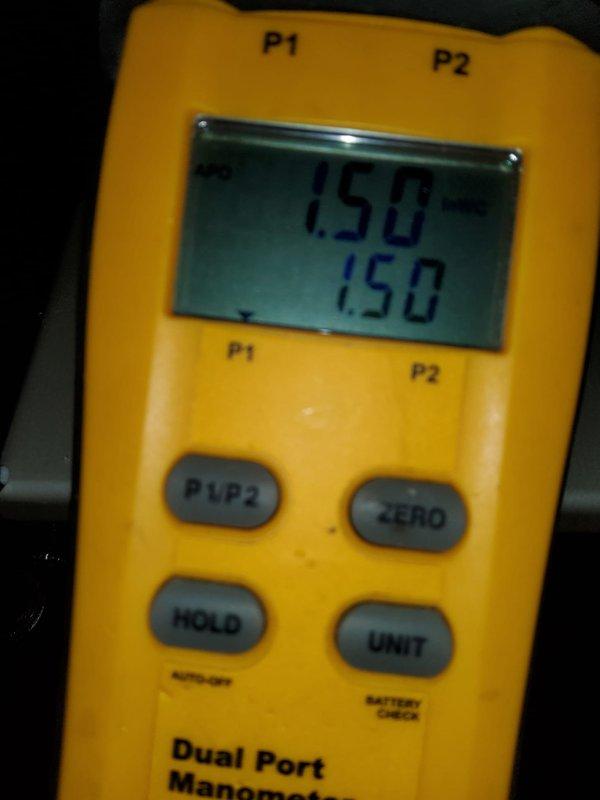 Completed full HVAC system installation at residential property. Performed system diagnostics and pressure testing using digital manometer to verify proper refrigerant pressures and airflow balance across both ports, with readings stabilized at 1.50 on P1 and P2. Repositioned outdoor air conditioning unit back onto mounting brackets per customer request and secured unit to manufacturer specifications. Conducted final system performance verification using Fieldpiece digital gauges, confirming optimal operating parameters with readings at 99 degrees, indicating proper refrigerant charge and system functionality.
