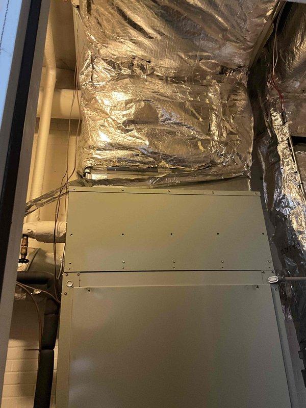 Conducted comprehensive commercial HVAC replacement estimate for first-floor air conditioning system and rooftop unit. Assessed existing air handler installation in mechanical room, documenting equipment configuration including ductwork, insulation integrity, and spatial constraints for future replacement planning.