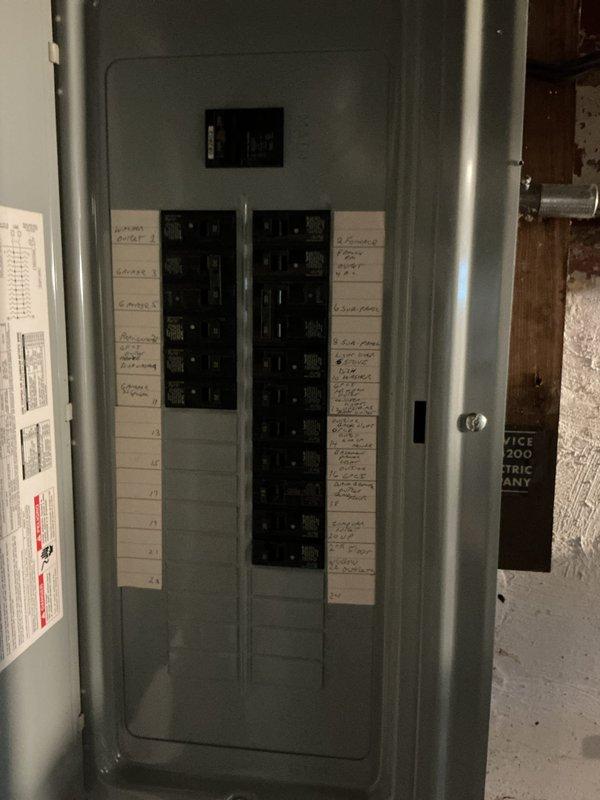 Conducted on-site HVAC system evaluation for equipment replacement estimate in residential basement mechanical room. Assessed existing Carrier furnace installation, electrical panel capacity, ductwork configuration, and PVC venting system to determine replacement specifications and installation requirements.