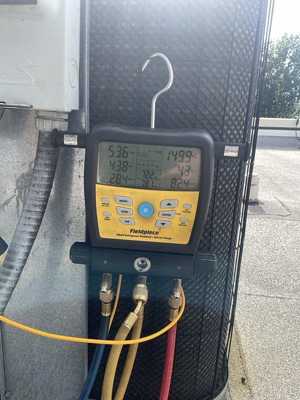 Performed comprehensive tune-up on 20-year-old Lennox air conditioning system. Conducted complete system diagnostics using manifold gauges to verify refrigerant pressures and temperatures across both the outdoor condensing unit and indoor air handler. All readings were within manufacturer specifications, confirming proper system operation and refrigerant charge. Inspected electrical components, cleaned condenser coils, and verified proper airflow throughout the system. Unit operating efficiently with no deficiencies noted.