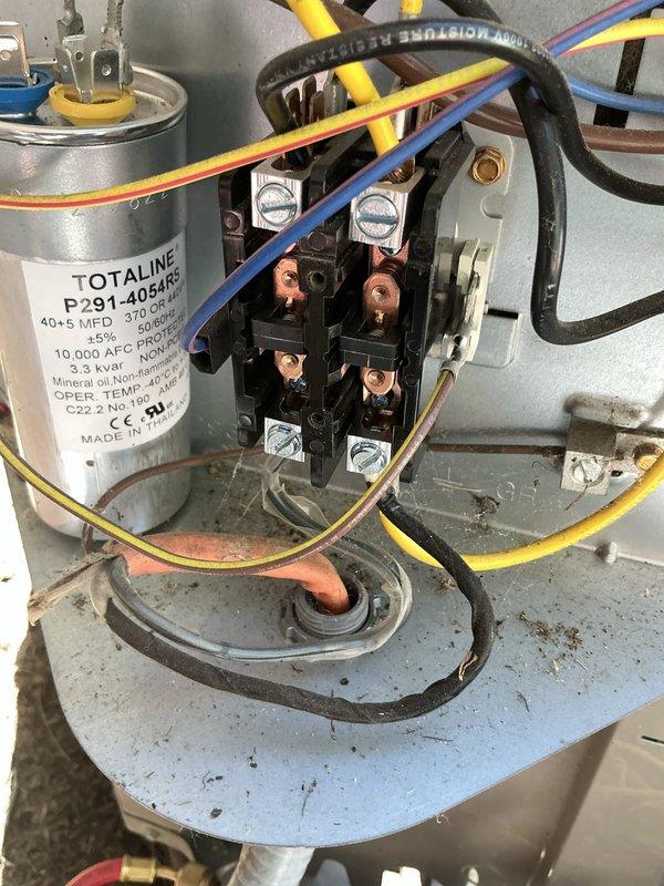 Responded to service call for seven-year-old air conditioning unit experiencing short cycling issues. Upon inspection, performed thorough system cleaning as requested and evaluated electrical components including the capacitor (TOTALINE P291-4054RS, 40x5 MFD, 370 VAC) and contactor assembly. Conducted amperage testing using clamp meter to verify proper current draw and confirm system operation was restored to normal cycling parameters.