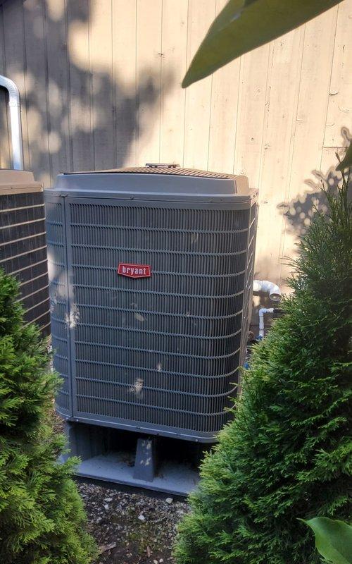 Performed refrigerant recovery service on Bryant heat pump system due to low charge condition. Recovered existing R-410A refrigerant, evacuated system to proper vacuum specifications, and recharged unit with factory specification of 14 lbs of R-410A refrigerant. Applied leak sealant with UV dye to address refrigerant loss issue, with customer understanding that additional refrigerant may be required based on operational pressures and that leak sealant application does not guarantee leak resolution or include comprehensive leak detection service.
