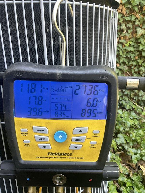 Performed cooling maintenance on an 11-year-old heat pump system (Model: CNPVP3617ALA4AAA, manufactured May 2019). Conducted comprehensive diagnostic testing using refrigerant manifold gauges, recording system pressures of 118.1 PSIG on the low side and 273.6 PSIG on the high side with R-410A refrigerant. System operating parameters verified and found within acceptable range for cooling mode operation.