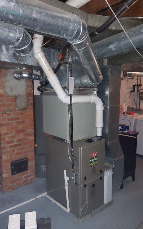 Completed annual cooling system maintenance on a 7-year-old residential air conditioning system. Performed comprehensive tune-up including inspection of outdoor condenser unit and indoor furnace/air handler, cleared vegetation growth from condenser louvers to restore proper airflow, verified all electrical connections, tested system operation, and confirmed equipment is functioning within normal parameters for the cooling season.