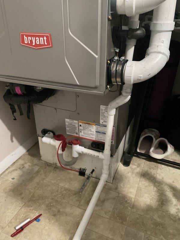 Responded to service call for 2-year-old Bryant AC system not operating properly that we originally installed. Upon arrival, performed diagnostic inspection of both outdoor condenser unit and indoor air handler. Checked electrical connections, refrigerant levels, and condensate drainage system. Verified proper operation of condensate pump assembly and cleared any blockages in drain lines. Inspected all PVC piping connections for leaks and confirmed secure fittings. Tested system startup and confirmed unit cycled on properly, achieving normal operating temperatures and pressures. System restored to full operational status.