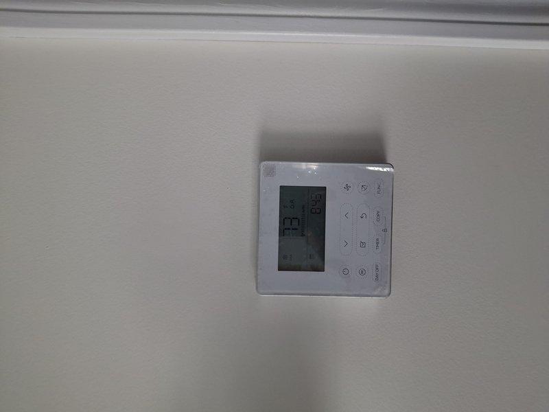 Responded to no cooling call on recently installed system. Found thermostat displaying communication error (dashes on display). Diagnosed faulty control board communication issue and confirmed system failure code 8/830 KS, indicating loss of signal between thermostat and air handler control board.