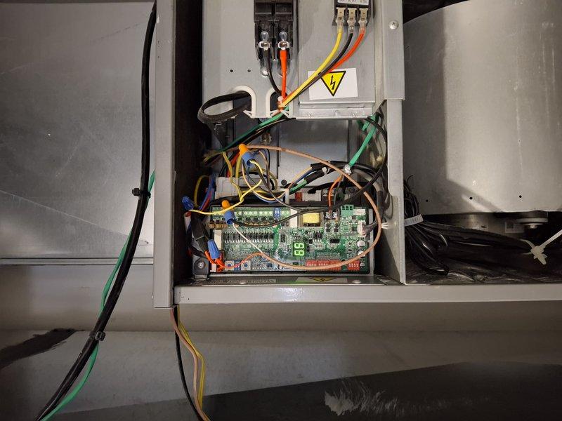 Responded to no cooling call on recently installed system. Found thermostat displaying communication error (dashes on display). Diagnosed faulty control board communication issue and confirmed system failure code 8/830 KS, indicating loss of signal between thermostat and air handler control board.