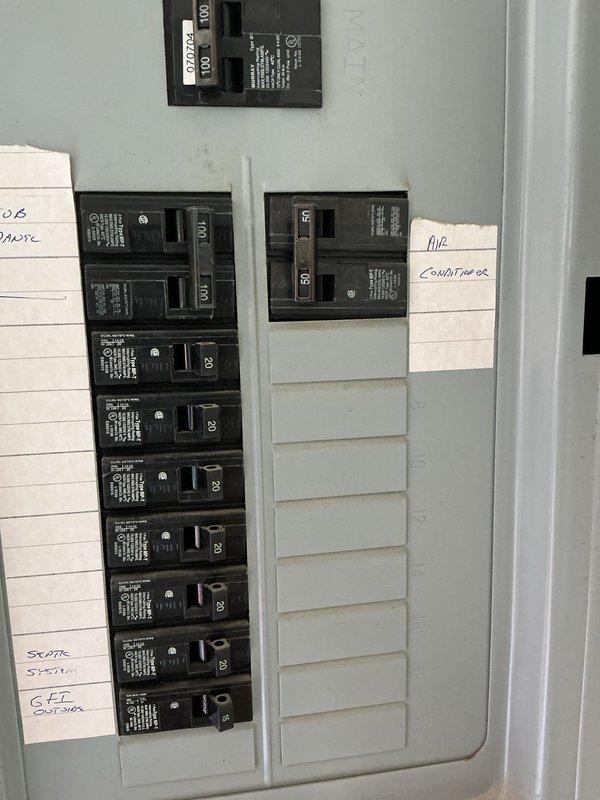Conducted follow-up inspection and documentation of existing electrical service panel in preparation for HVAC system replacement. Photographed current electrical configuration, including main service disconnect, circuit breaker layout, and existing air conditioner circuit identification to assess compatibility and electrical capacity requirements for new equipment installation.