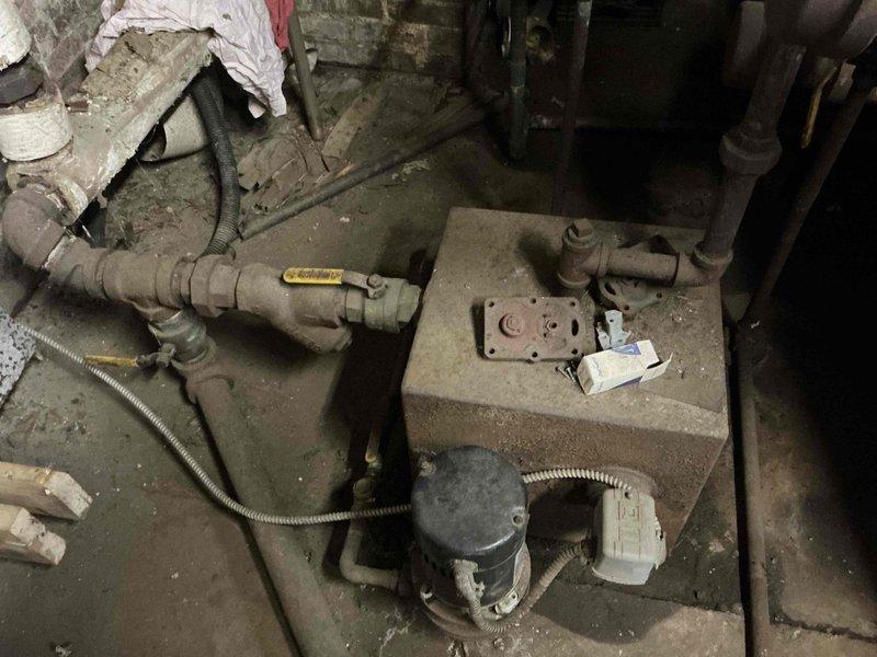 Conducted on-site assessment of existing commercial steam boiler system at church facility to provide replacement estimate. Documented current boiler configuration, including aged piping infrastructure, pump assemblies, control systems, and associated mechanical components showing significant corrosion and deterioration. Evaluated utility room conditions, existing brick structure, concrete flooring, and spatial requirements for new boiler installation and recommended system upgrades to meet current operational needs.