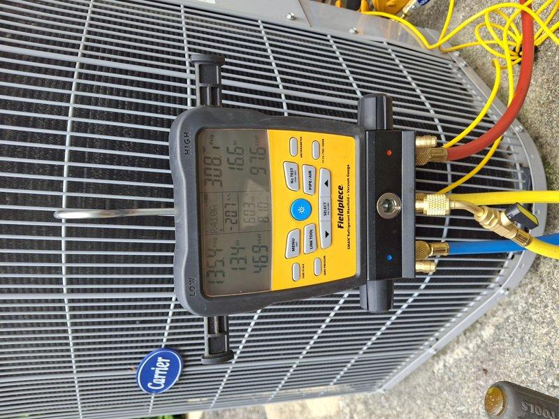 Performed complete tune-up and system diagnostics on 14-year-old residential air conditioning unit during scheduled 12-4 service window. Utilized digital manifold gauge set to measure operating pressures and temperatures, verified refrigerant charge levels, and inspected condenser coil fins for proper airflow. All system parameters were within normal operating range, and unit nameplate specifications were documented for service records.