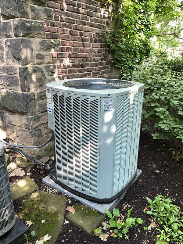 Responded to service call for a five-year-old air conditioning system experiencing freeze-up conditions at the outdoor condenser unit. Performed initial assessment of the exterior condensing unit located at ground level with easy stairway access, noting frozen coil condition that required defrost time before completing full diagnostic evaluation. Scheduled follow-up appointment to return same day in the afternoon to complete comprehensive diagnostic testing once unit had adequate time to thaw and determine root cause of freeze-up issue, with possible air handler inspection needed in attic space.