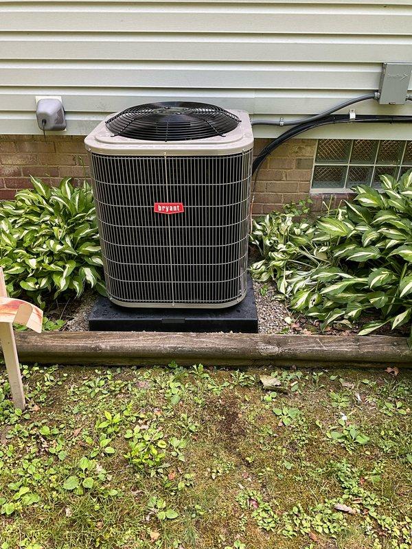 Completed full HVAC system replacement including installation of new high-efficiency Bryant furnace in basement mechanical room and 14 SEER Bryant air conditioning condenser unit on exterior pad. All equipment properly positioned, vented with PVC piping, electrically connected, and tested for operational functionality with financing arranged through Wells Fargo.