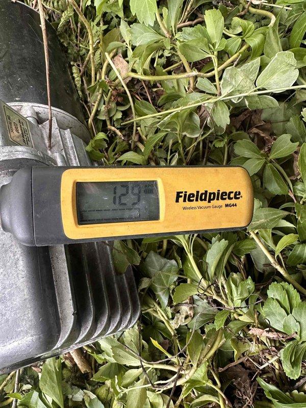 Completed installation of new air conditioning system with evaporator coil and Ecobee smart thermostat integrated with existing furnace. Positioned condensing unit at rear corner of sunroom, routed refrigerant line set and electrical wiring along exterior of house, evacuated system to proper vacuum levels, and verified all components operational with thermostat displaying correct temperature readings.