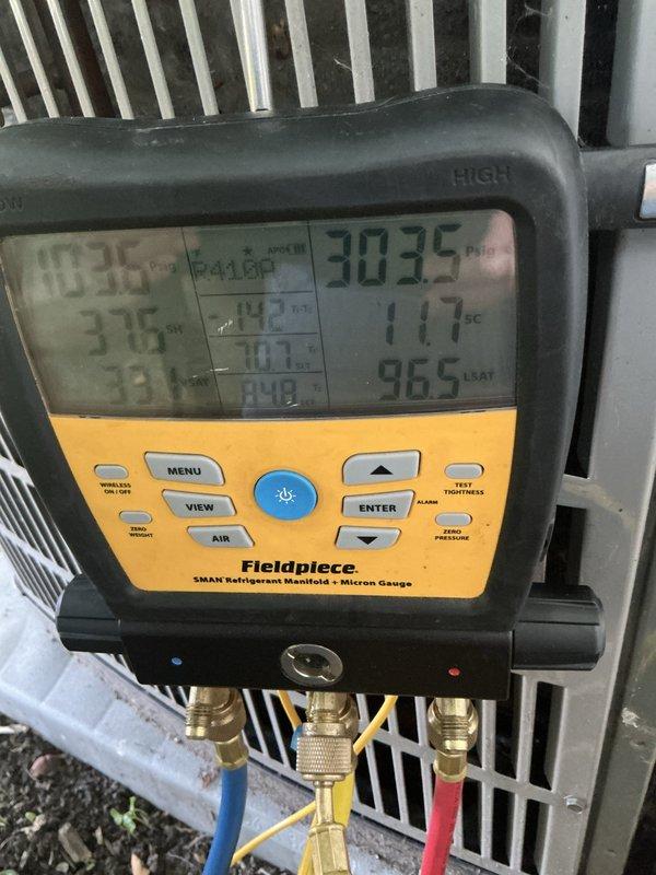 Completed preventative maintenance tune-up on 2-3 year old air conditioning system. Performed system diagnostics using refrigerant manifold gauge, verifying proper operating pressures and temperatures across the system. Inspected blower wheel assembly and confirmed proper operation with normal dust accumulation for equipment age.