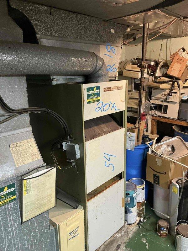 Conducted comprehensive assessment of existing HVAC system in basement mechanical room to provide repair versus replacement estimate for air conditioning equipment. Evaluated current furnace/air handler unit condition, inspected ductwork infrastructure including insulated supply and return ducts, and documented equipment specifications and model information. Photographed existing system configuration, mechanical room layout, and surrounding utility components to support detailed replacement proposal for customer decision-making.