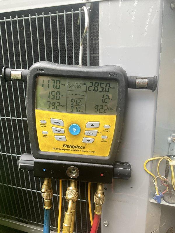 # HVAC Maintenance - Cooling System Service

Performed comprehensive AC tune-up on 6-year-old R-410A cooling system currently operating within normal parameters. Conducted complete system diagnostics using refrigerant manifold gauges, measuring superheat, subcooling, and operating pressures across both low and high sides to verify proper refrigerant charge and system performance.

Completed standard preventive maintenance protocol including visual inspection of outdoor condensing unit, verification of unit data plate specifications, and assessment of electrical connections. Tested system operation under load conditions with digital diagnostic equipment confirming proper temperature differentials and airflow characteristics.

Evaluated home comfort concerns regarding insufficient cooling capacity to upstairs bedrooms. Discussed potential solutions with property owner including zoning system options, ductwork modifications for improved airflow distribution, and supplemental cooling equip