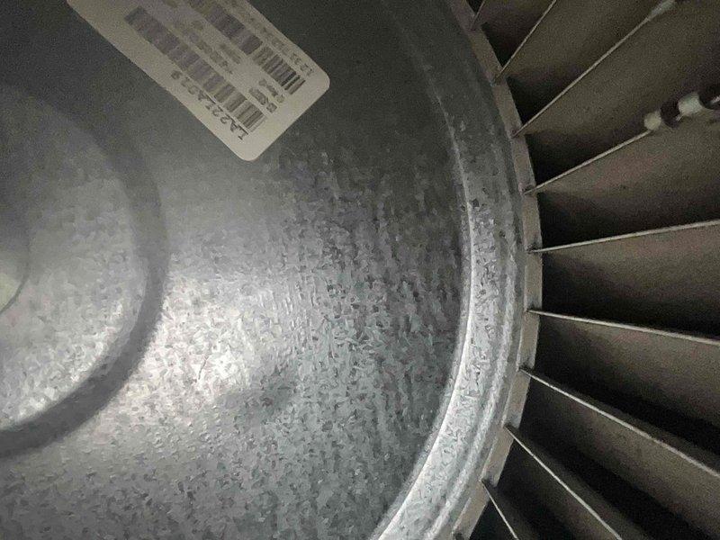 Responded to service call for 2-year-old air conditioning system reported as not working properly. Upon inspection, discovered extensive frost and ice buildup on evaporator coil and blower assembly, indicating restricted airflow or low refrigerant charge. Performed diagnostic testing using refrigerant manifold gauges to measure system pressures and temperatures. Low-side pressure reading of 0.045 psig and high-side pressure of 274.7 psig confirmed severely restricted airflow due to dirty or blocked evaporator coil causing system to freeze.

Shut down system to allow complete defrost of evaporator coil. Inspected air filter and found it heavily soiled, restricting airflow to the system. Replaced air filter with proper size filter. Once coil fully defrosted, verified blower motor operation and checked fan speed settings. Cleaned evaporator coil thoroughly to remove dust and debris accumulation.

After coil cleaning and filter replacement, restarted system and monitored operation. Recheck