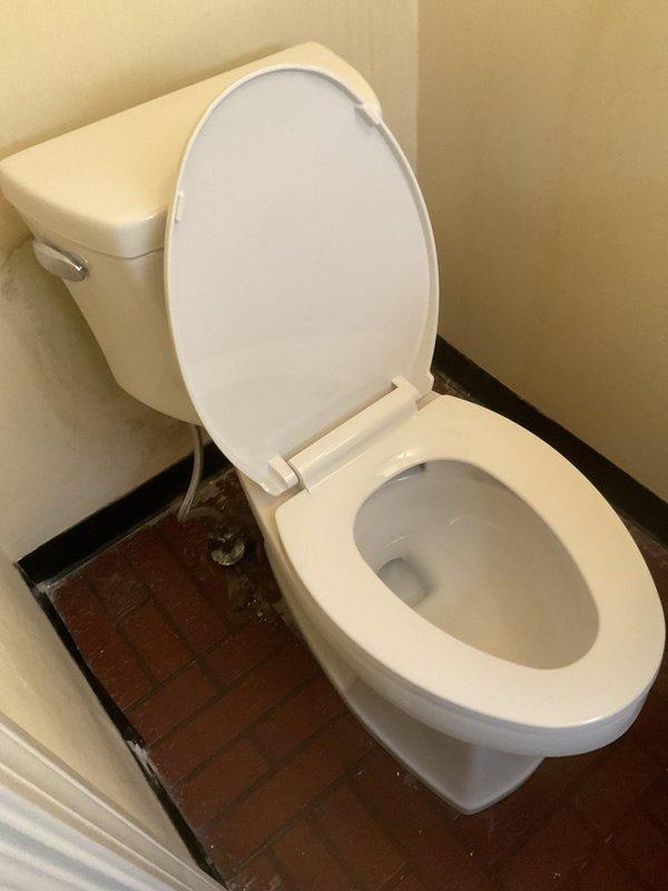 Replaced and rerouted PVC drainage piping in attic crawl space, installing new vertical and horizontal runs with proper fittings and transitions to black ABS connections. Verified proper drainage flow and completed all-day plumbing repair to restore full system functionality to residential bathroom toilet fixture.