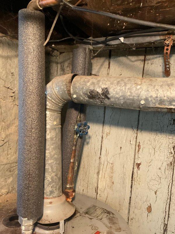 Responded to service call for water heater experiencing sparking at burner assembly with failure to ignite. Upon inspection, diagnosed ignition system malfunction preventing proper gas valve operation and burner lighting sequence. Contacted property owner to report findings and discuss repair options for the malfunctioning tanked water heater unit. Documented existing conditions including aging infrastructure and recommended follow-up service to restore hot water functionality.