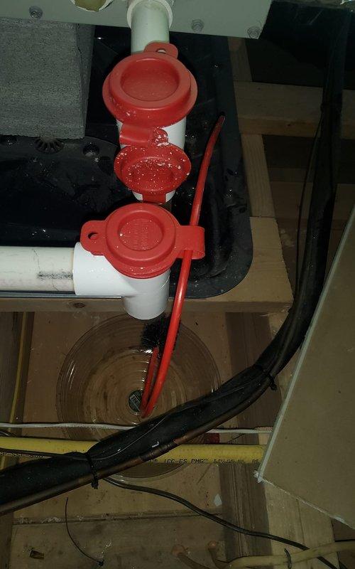 Completed annual cooling maintenance tune-up on two residential air conditioning units. Inspected Lennox outdoor condenser unit, verified proper operation of all components, and documented drainage system with cleanout access point in attic space. All systems tested and operating within normal parameters.