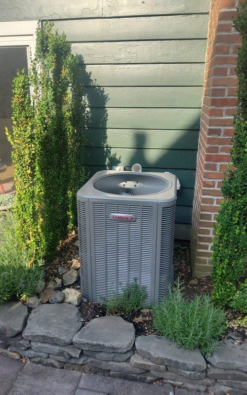 Completed annual cooling maintenance tune-up on two residential air conditioning units. Inspected Lennox outdoor condenser unit, verified proper operation of all components, and documented drainage system with cleanout access point in attic space. All systems tested and operating within normal parameters.
