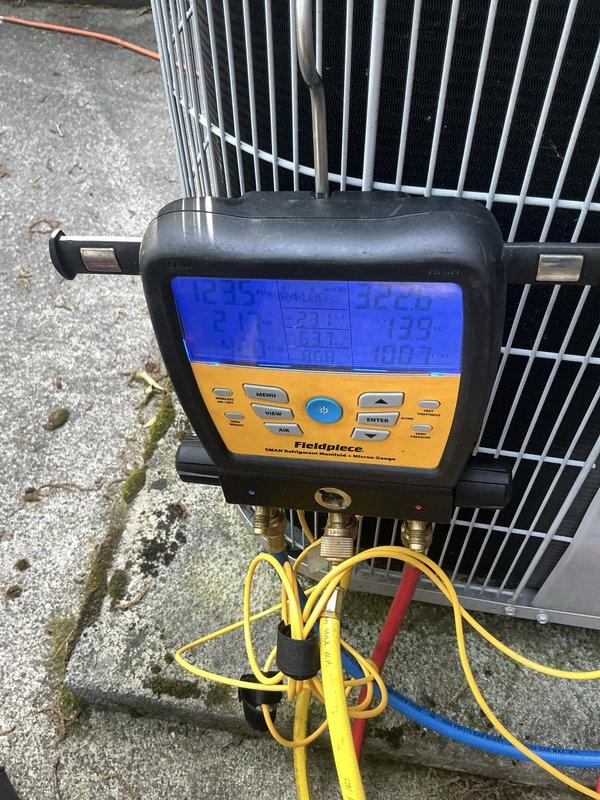 Performed comprehensive preventive maintenance on 9-year-old residential air conditioning system. Utilized Fieldpiece diagnostic manifold gauge to measure and verify refrigerant pressures and system performance parameters. Inspected condenser unit components including fan assembly and blower wheel, confirming proper operation and adequate airflow. All system readings were within manufacturer specifications, and unit is operating efficiently for continued cooling season performance.