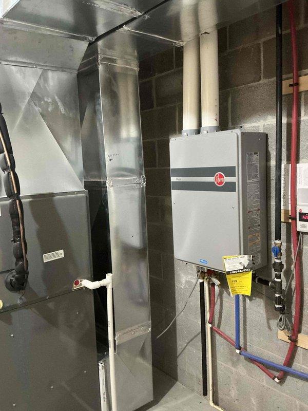 Conducted comprehensive on-site evaluation for complete heating and cooling system replacement. Assessed existing indoor air handler unit with sheet metal ductwork and outdoor condenser unit currently positioned in vegetation-dense area with inadequate clearance. Documented current equipment configuration, installation conditions, and spatial requirements to prepare detailed replacement estimate for new HVAC system.