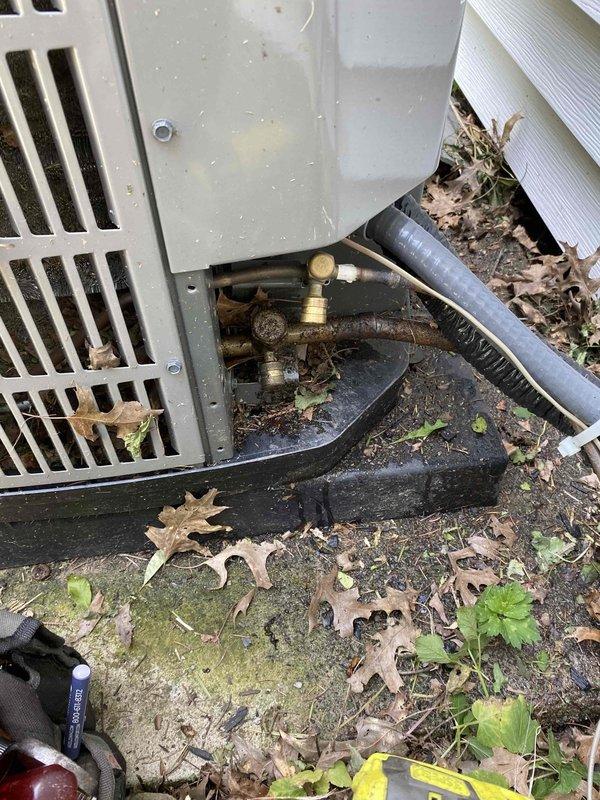 Responded to no-cooling complaint on 9-year-old central air conditioning system. Upon inspection, discovered significant cracking in the evaporator coil assembly, causing refrigerant leak and loss of cooling capacity. System was maintaining airflow but unable to achieve temperature setpoint of 78°F due to compromised coil integrity. Documented damage with photographs showing extensive stress fractures in coil casing and deteriorated surface conditions. Recommended evaporator coil replacement to restore proper system operation and cooling performance.