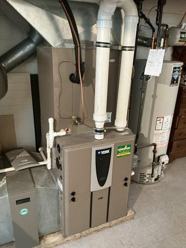Responded to emergency no-cooling call and performed comprehensive system evaluation of existing York furnace and HVAC equipment in residential basement mechanical room. After assessment, provided detailed estimate for complete HVAC system replacement to restore cooling functionality and improve overall system efficiency and reliability.
