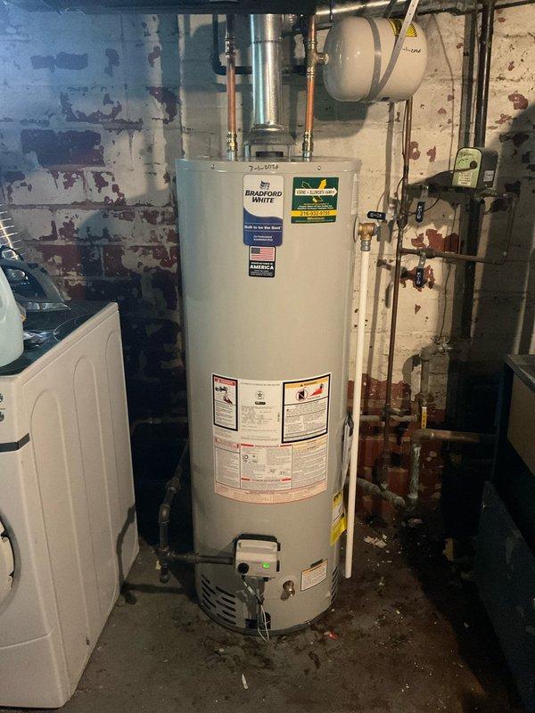 Replaced existing 40-gallon residential water heater with new Bradford White unit. Installation included connecting gas line, water supply lines, and installing ICON System electronic control module with pilot safety features. Verified all connections, tested gas valve operation, and ensured proper venting and combustion safety protocols were met.