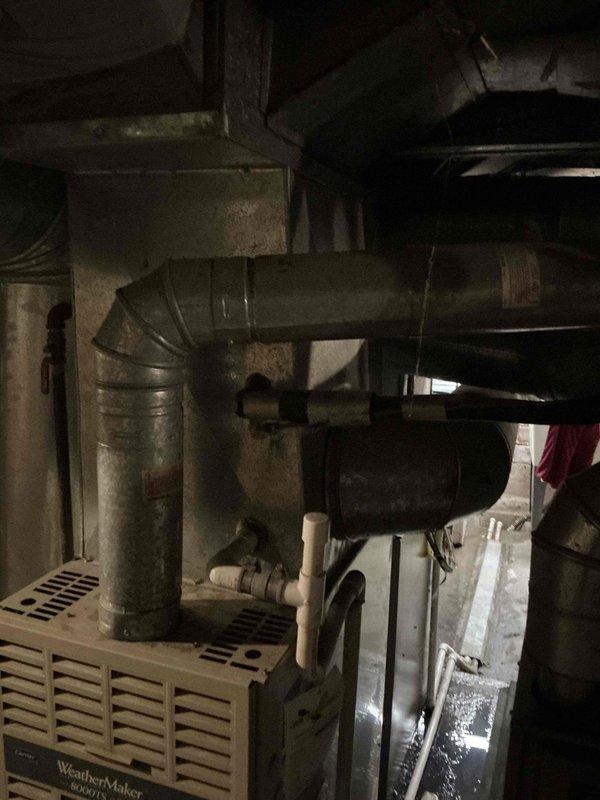 Responded to service call for air conditioning system not cooling entire home. Upon inspection, evaluated existing WeatherMaker HVAC equipment located in basement utility area, noting system age of approximately 24+ years based on home purchase history and equipment condition. Documented existing electrical panel configuration with Square D QO load center, photographed current ductwork installation including galvanized metal supply ducts and equipment connections, and assessed overall system layout with PVC condensate drainage. Provided comprehensive estimate for complete HVAC system replacement due to age and performance issues affecting whole-house comfort.