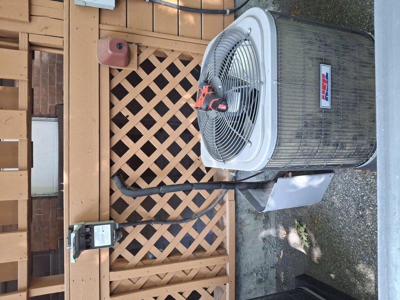 Responded to no cooling complaint at apartment 4 for a 9-year-old air conditioning system. Upon arrival, performed visual inspection of outdoor condenser unit, which showed significant accumulation of dirt, dust, and debris on coil fins affecting heat transfer efficiency. Conducted diagnostic testing using digital multimeter to verify electrical components and system operation. Assessed condenser unit mounted on concrete pad with evidence of weathering and environmental exposure. Evaluated indoor air handling components and ductwork connections. System restored to proper cooling operation following service procedures.